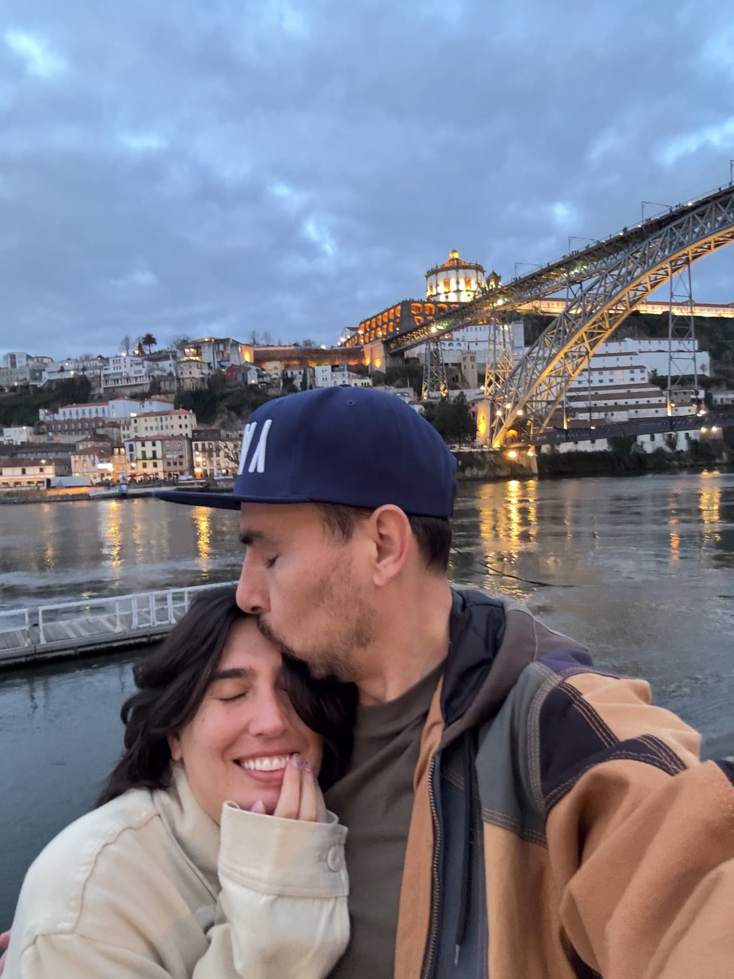 A selfie of Nina and Me with Dona Maria Pia Bridge in the background.