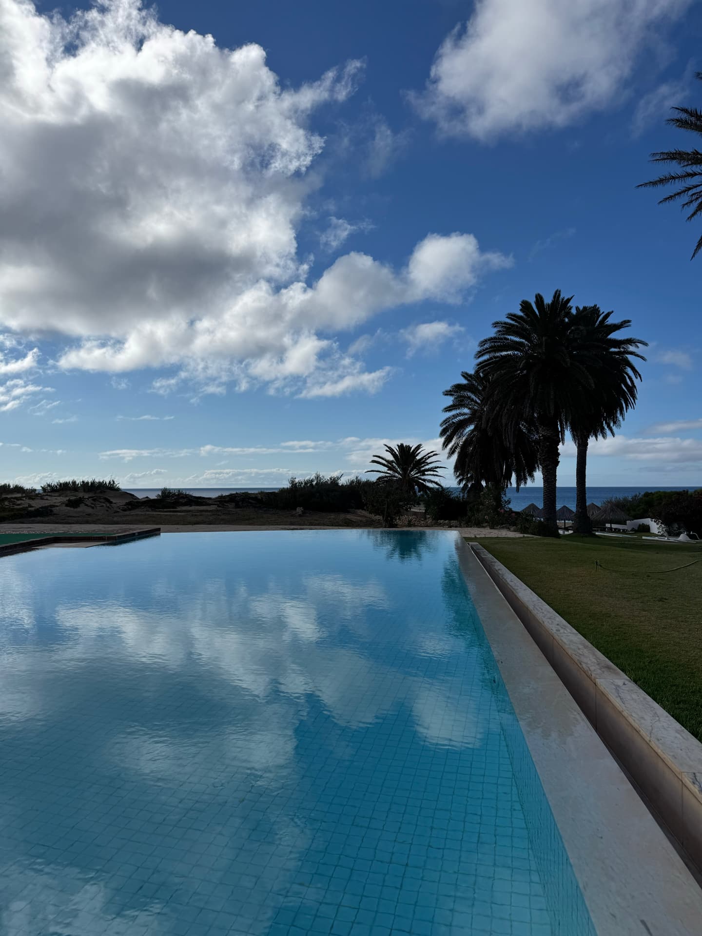 Hotel swimming pool with an ocean view. Decisions, decisions.